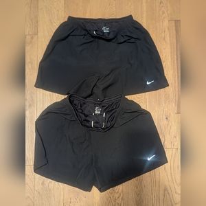 Nike ****Large Nike Dri-fit running shorts 2 pairs. Women's
